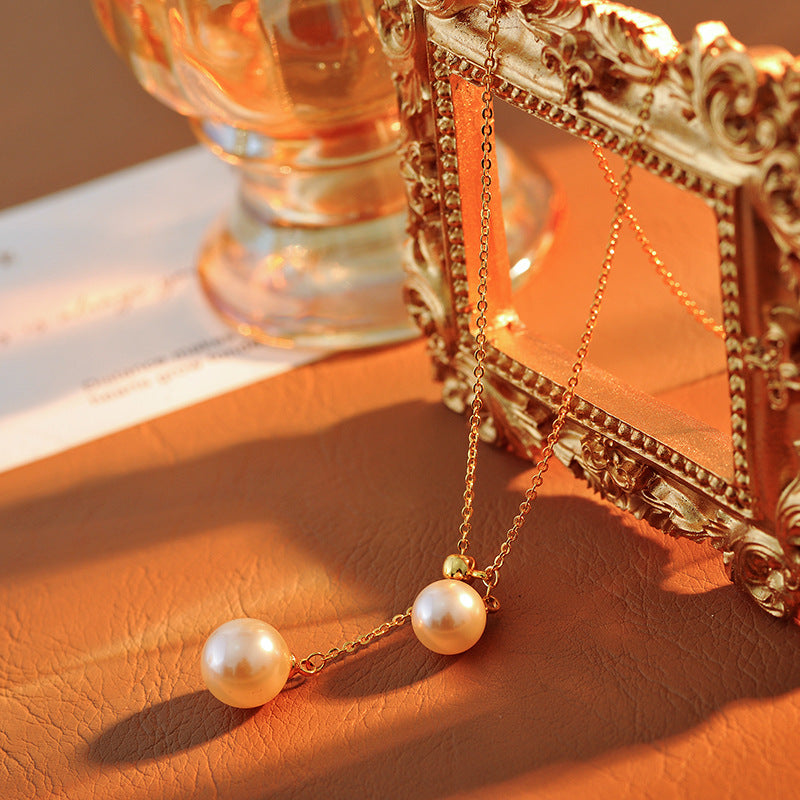 Light Luxury Fashion Design Natural Pearl Collarbone Necklace Strong Light Small Bulb Y-shaped Choker Simple Elegant Women's Ins Trend