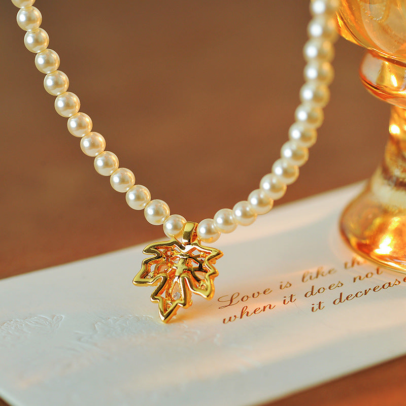 2025 New Maple Leaf Pearl Necklace Autumn Winter Light Luxury Niche Fashion Collarbone Chain Sweater Chain Versatile High-end Feel