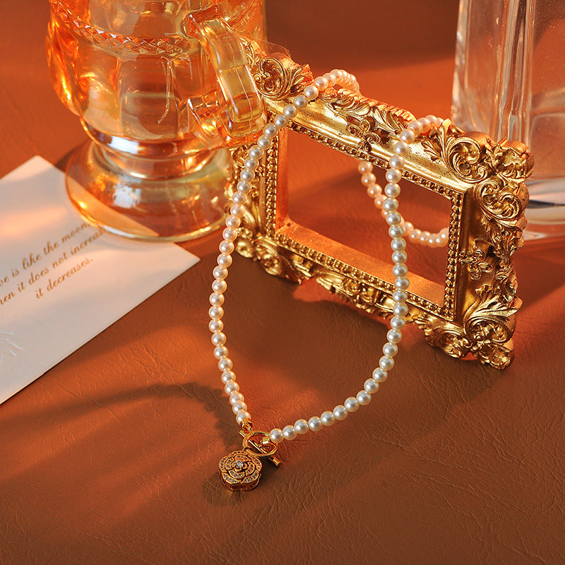 New Style Chanel-Style Beaded Necklace OT Buckle Camellia Pendant Simple Niche High-End Pearl Collarbone Chain