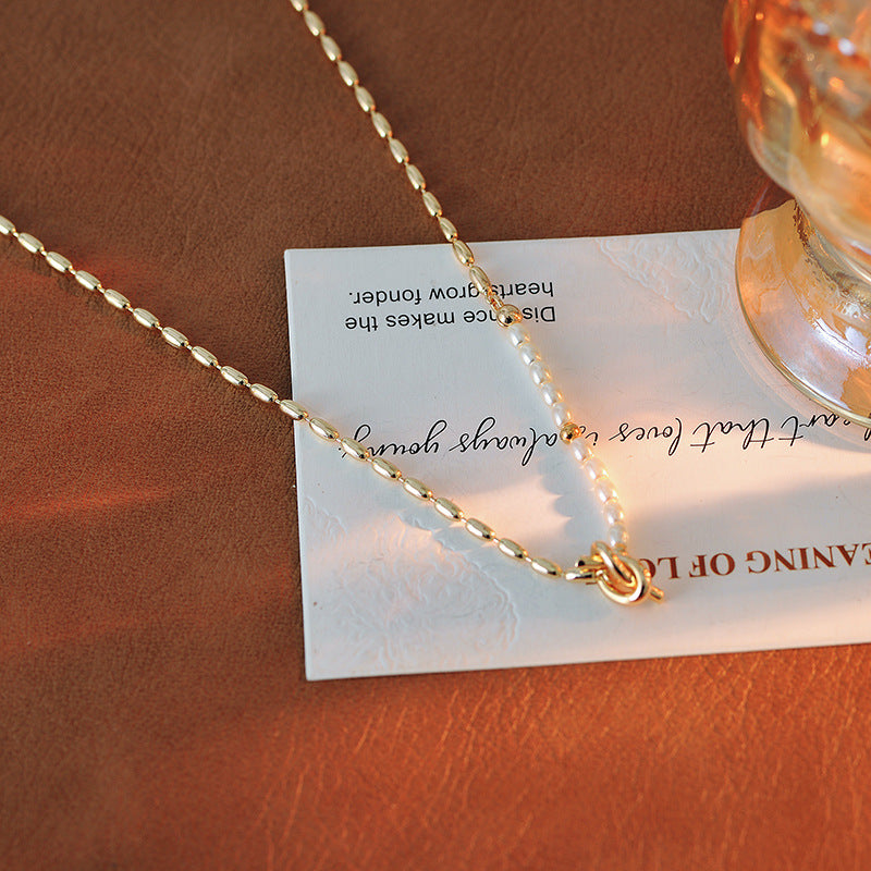 European and American Fashionable Elegant Pearl Knot Design Necklace Ins Trend Blogger Collarbone Chain One Piece