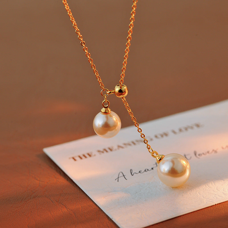 Light Luxury Fashion Design Natural Pearl Collarbone Necklace Strong Light Small Bulb Y-shaped Choker Simple Elegant Women's Ins Trend