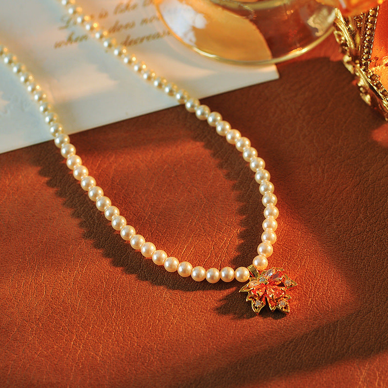 2025 New Maple Leaf Pearl Necklace Autumn Winter Light Luxury Niche Fashion Collarbone Chain Sweater Chain Versatile High-end Feel