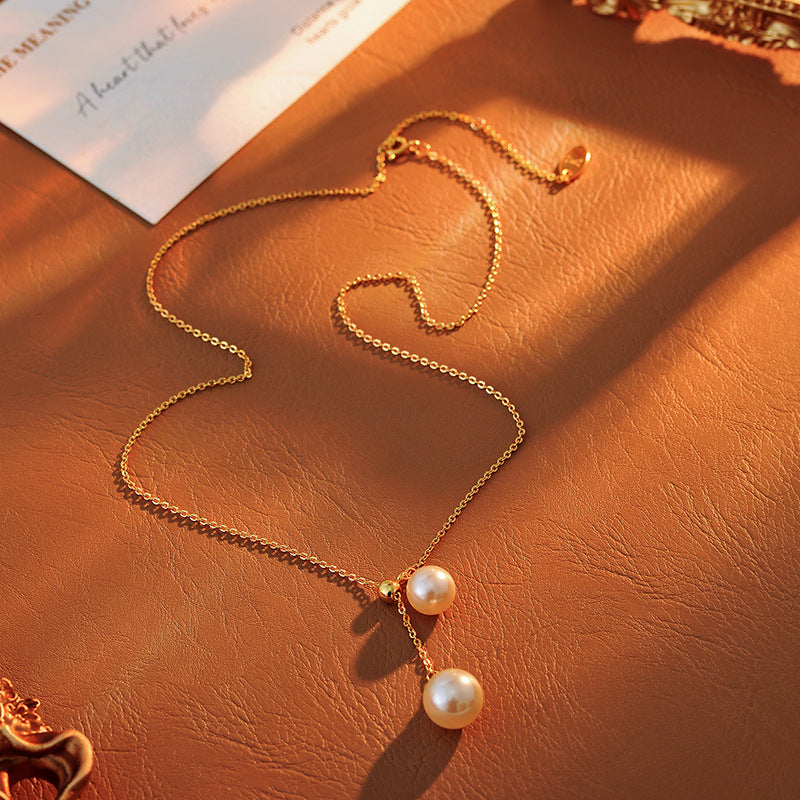 Light Luxury Fashion Design Natural Pearl Collarbone Necklace Strong Light Small Bulb Y-shaped Choker Simple Elegant Women's Ins Trend