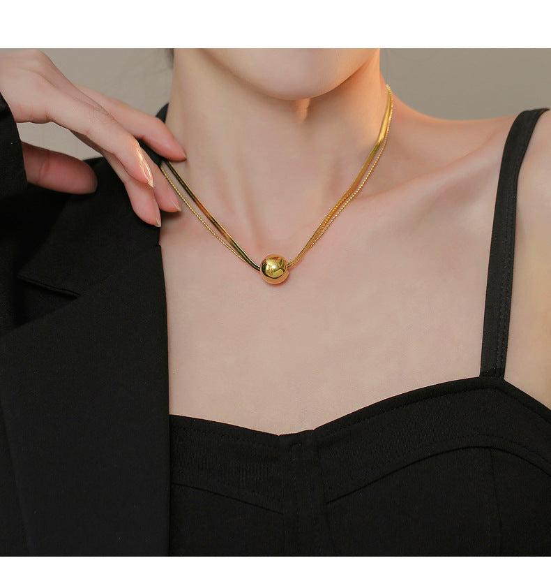Titanium Steel Gold Round Ball Pendant Snake Bone Necklace for Women Minimalist Style Simple Niche Design Fashion Collarbone Sweater Chain