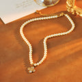 Saturn Flower Four-Leaf Clover Pearl Necklace Light Luxury Style High-End Design Collarbone Chain Elegant Necklace