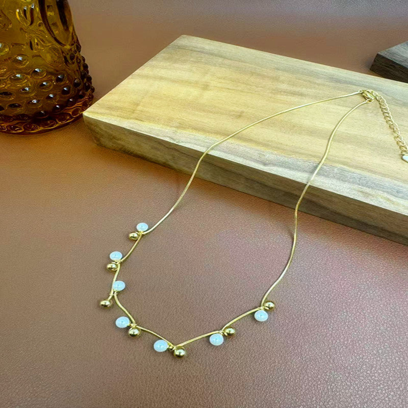 Hot-Selling Gold-Plated Small Pearl Necklace for Women, Light Luxury, Niche, High-End French Style, Elegant and Simple Collarbone Chain