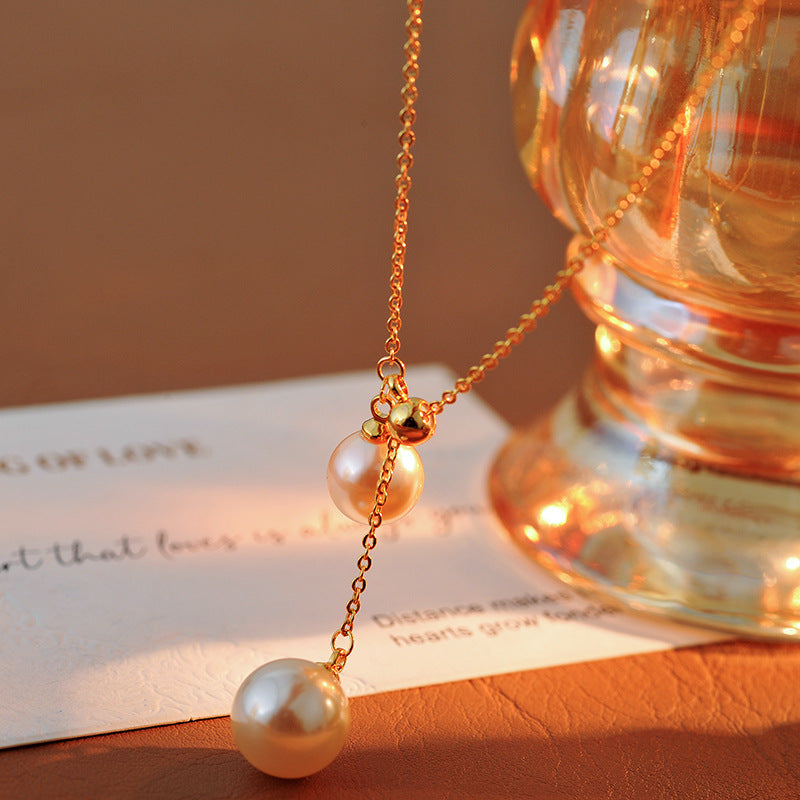 Light Luxury Fashion Design Natural Pearl Collarbone Necklace Strong Light Small Bulb Y-shaped Choker Simple Elegant Women's Ins Trend