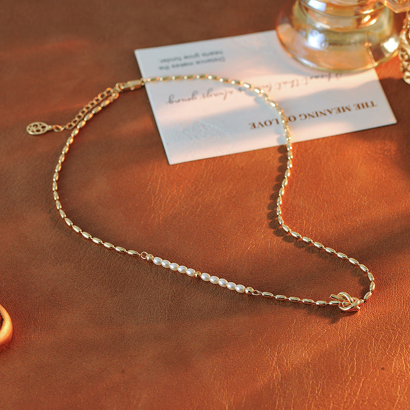 European and American Fashionable Elegant Pearl Knot Design Necklace Ins Trend Blogger Collarbone Chain One Piece