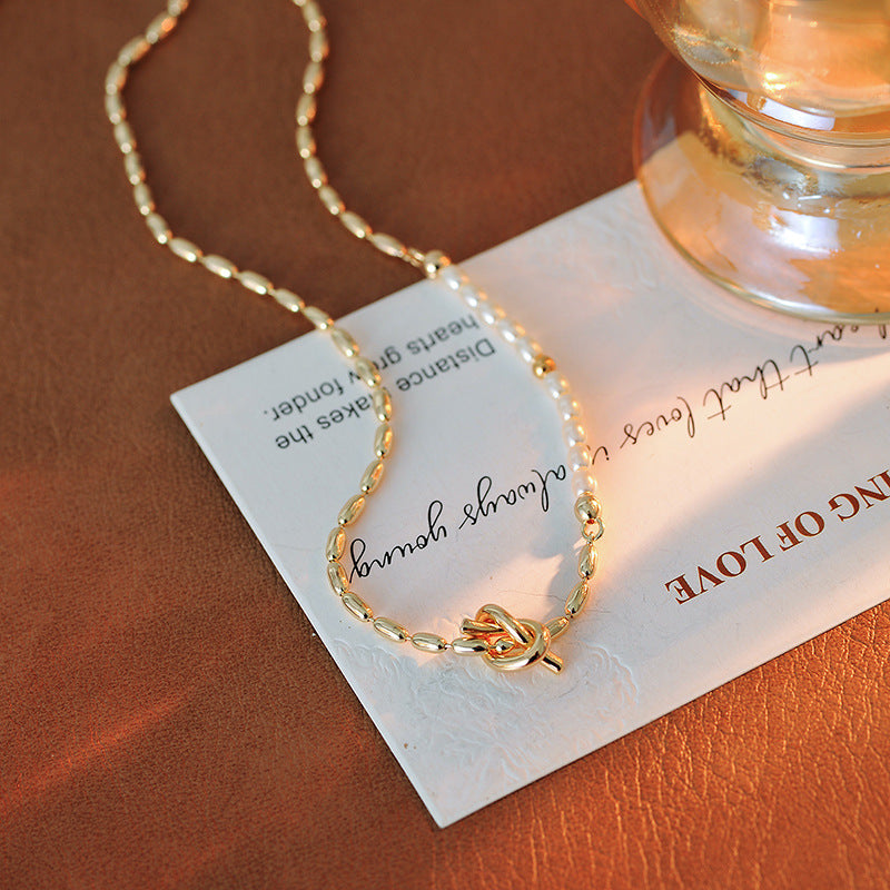 European and American Fashionable Elegant Pearl Knot Design Necklace Ins Trend Blogger Collarbone Chain One Piece