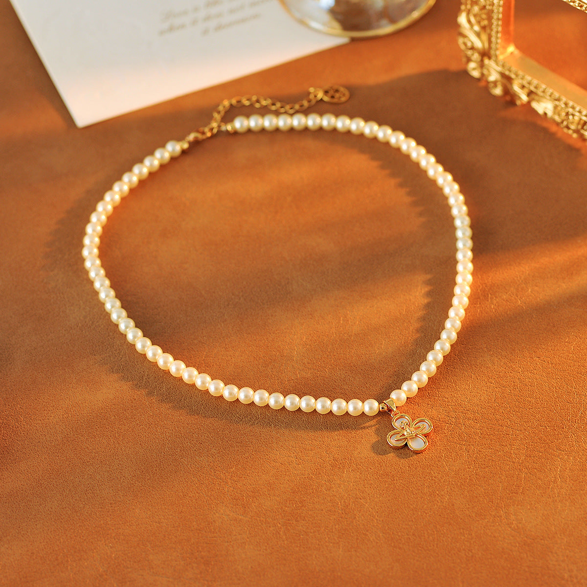 Saturn Flower Four-Leaf Clover Pearl Necklace Light Luxury Style High-End Design Collarbone Chain Elegant Necklace