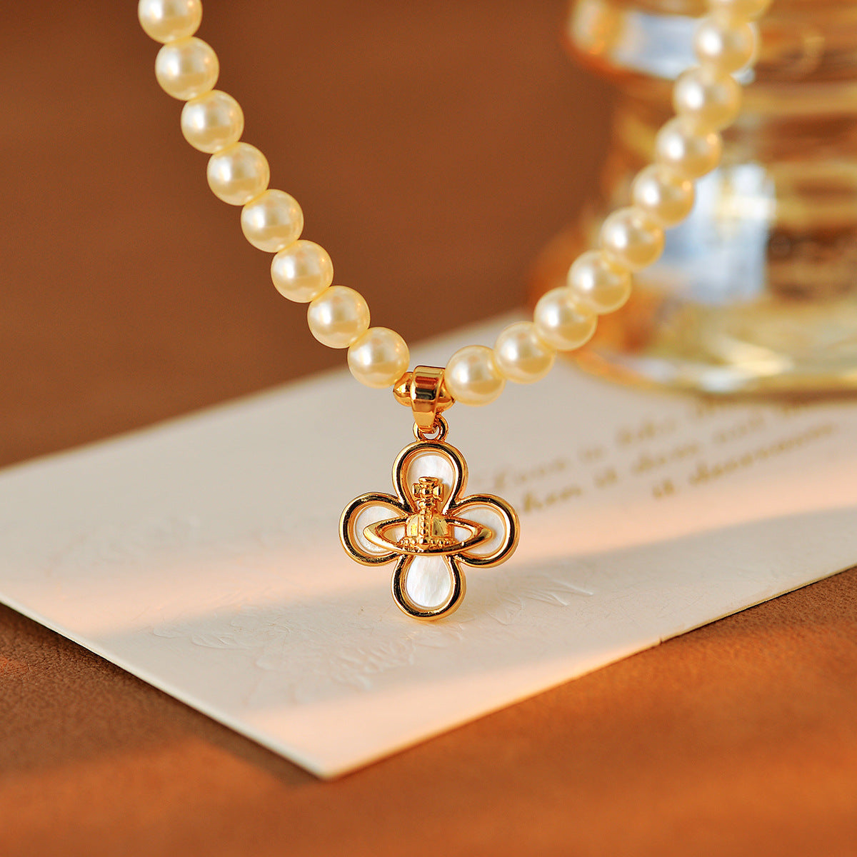 Saturn Flower Four-Leaf Clover Pearl Necklace Light Luxury Style High-End Design Collarbone Chain Elegant Necklace