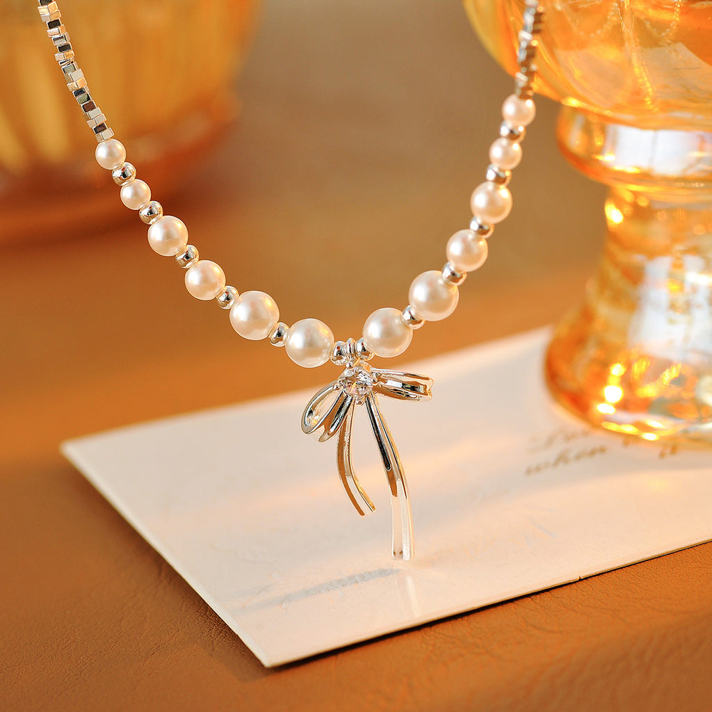 2025 New Hot Style Exquisite High-end Broken Silver Pearl Bowknot Light Luxury Niche Collarbone Necklace
