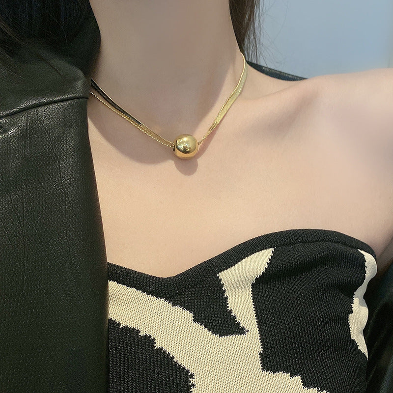 Titanium Steel Gold Round Ball Pendant Snake Bone Necklace for Women Minimalist Style Simple Niche Design Fashion Collarbone Sweater Chain
