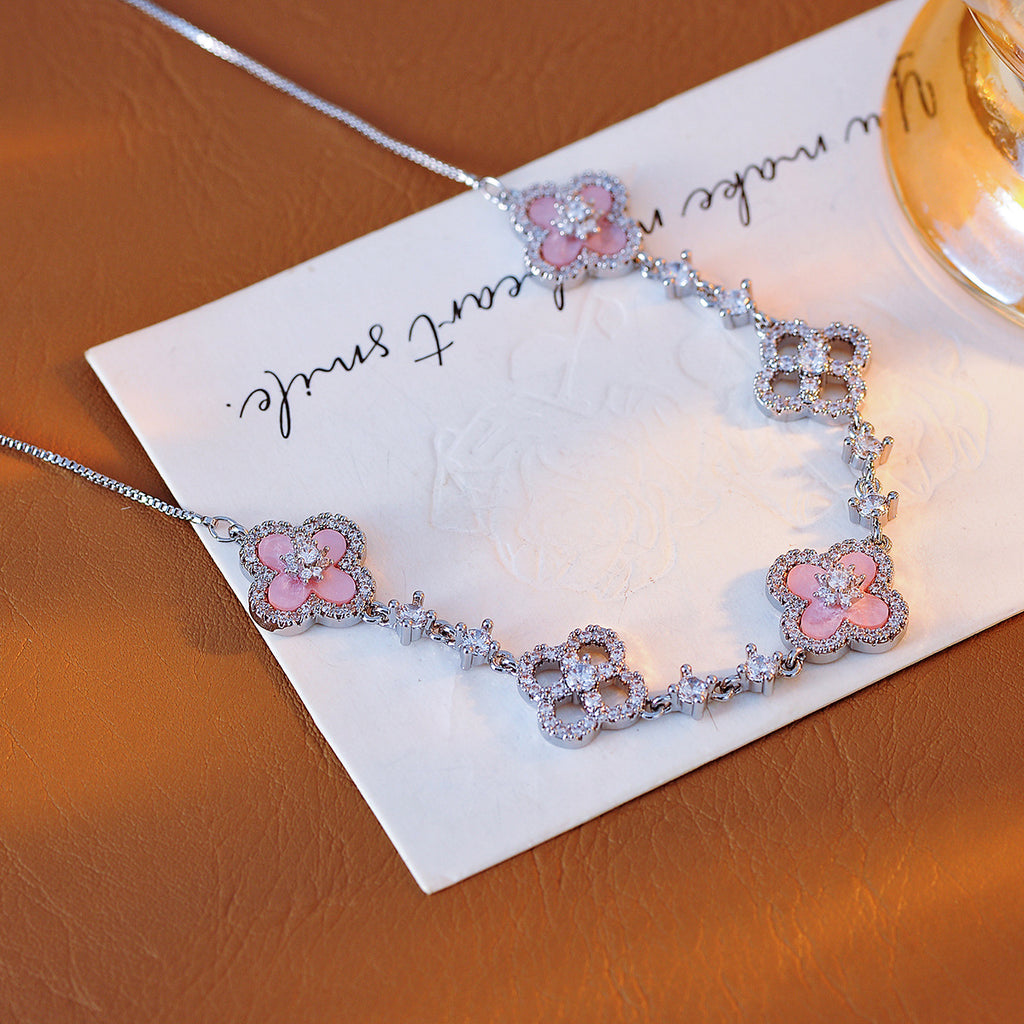 Exquisite Shiny Hot-Selling Natural Pink Shell Hollow Lucky Four-Leaf Clover Pull Necklace for Women Niche Light Luxury