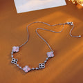 Exquisite Shiny Hot-Selling Natural Pink Shell Hollow Lucky Four-Leaf Clover Pull Necklace for Women Niche Light Luxury