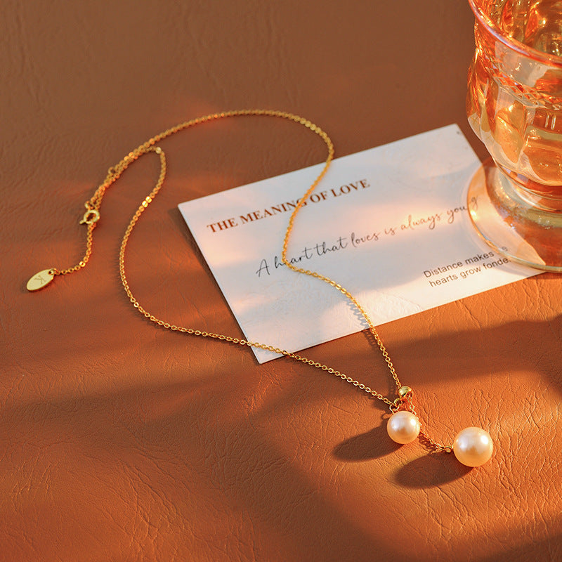 Light Luxury Fashion Design Natural Pearl Collarbone Necklace Strong Light Small Bulb Y-shaped Choker Simple Elegant Women's Ins Trend