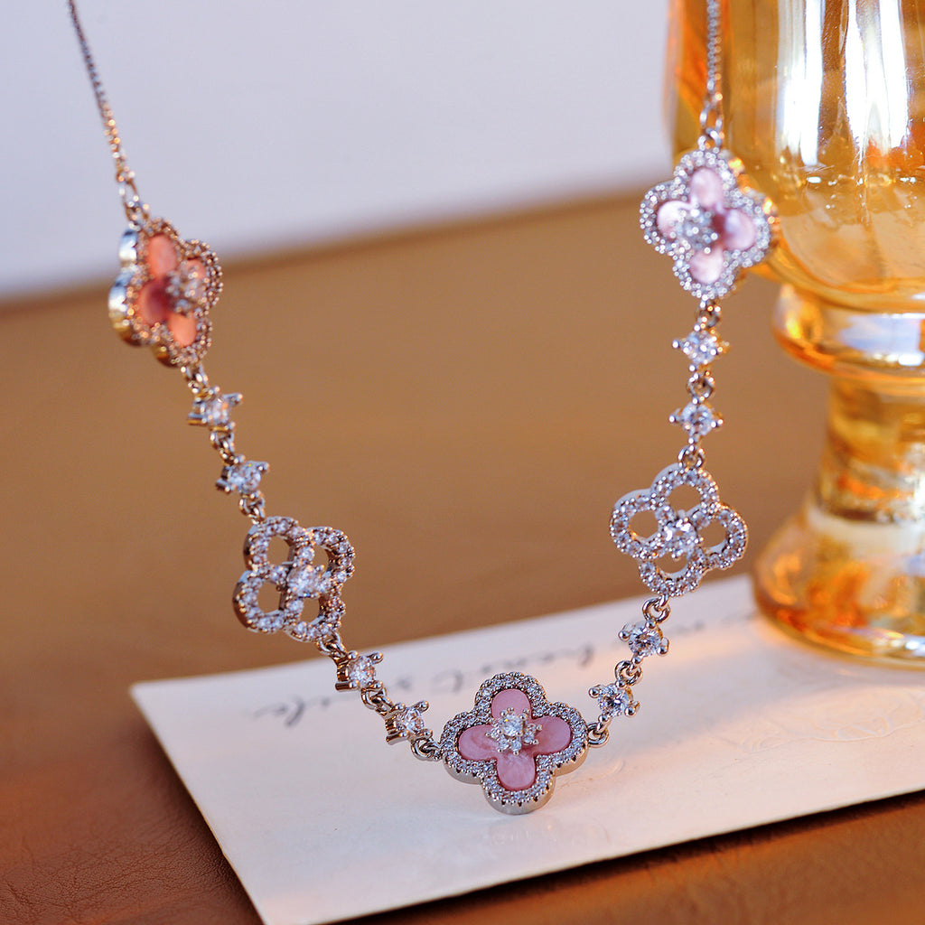 Exquisite Shiny Hot-Selling Natural Pink Shell Hollow Lucky Four-Leaf Clover Pull Necklace for Women Niche Light Luxury