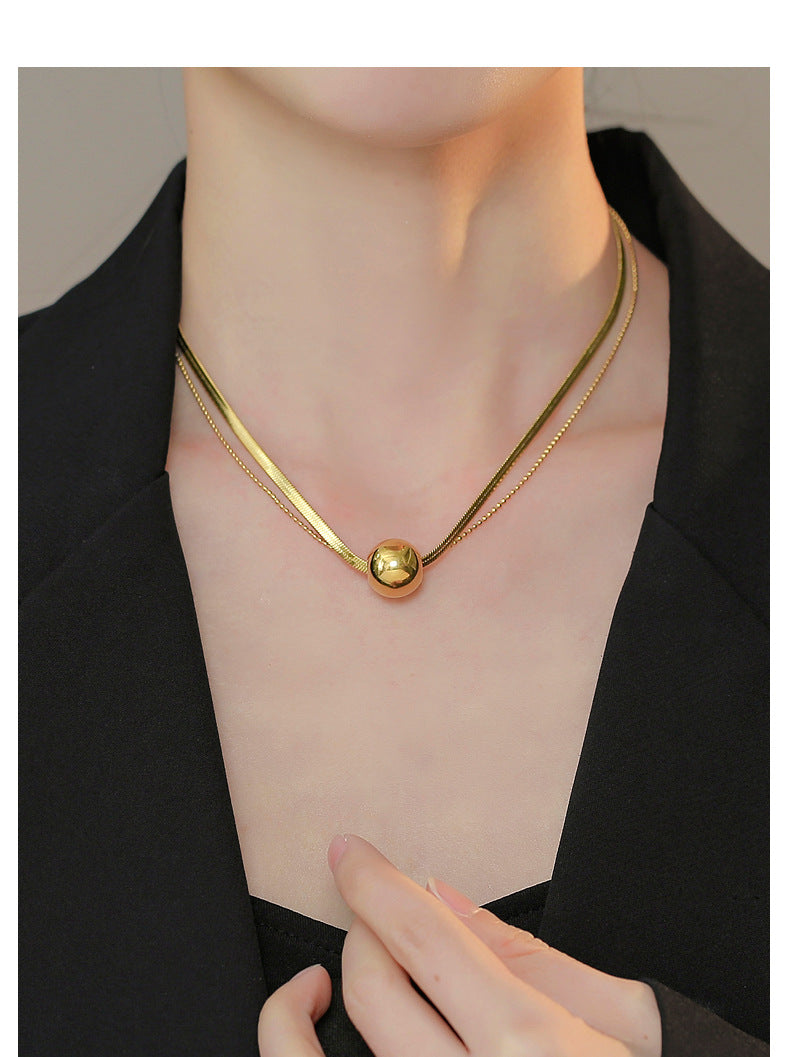 Titanium Steel Gold Round Ball Pendant Snake Bone Necklace for Women Minimalist Style Simple Niche Design Fashion Collarbone Sweater Chain