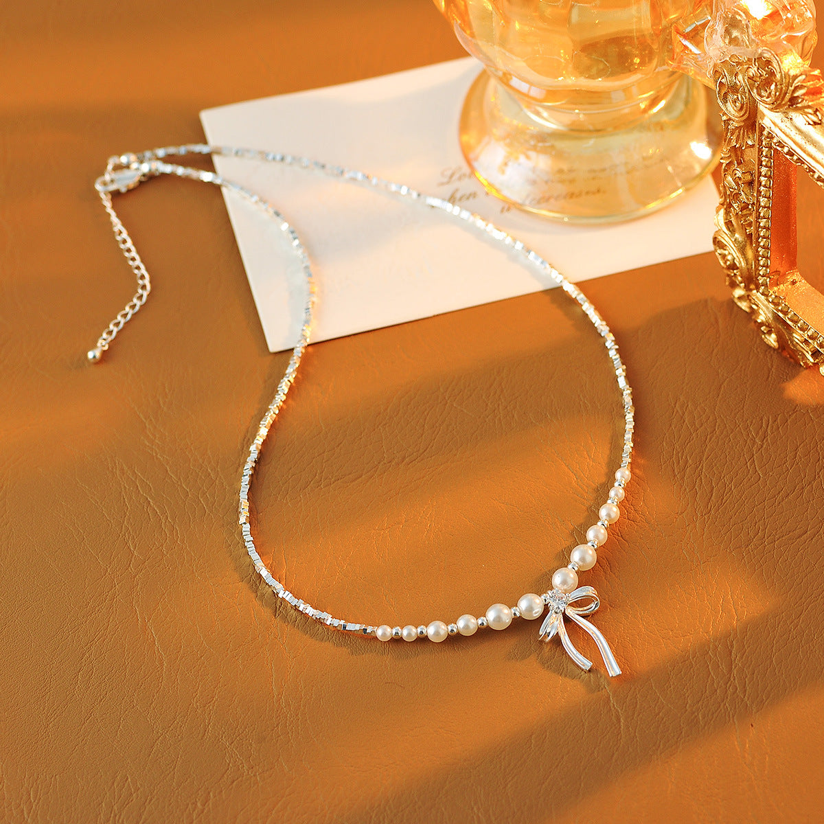 2025 New Hot Style Exquisite High-end Broken Silver Pearl Bowknot Light Luxury Niche Collarbone Necklace