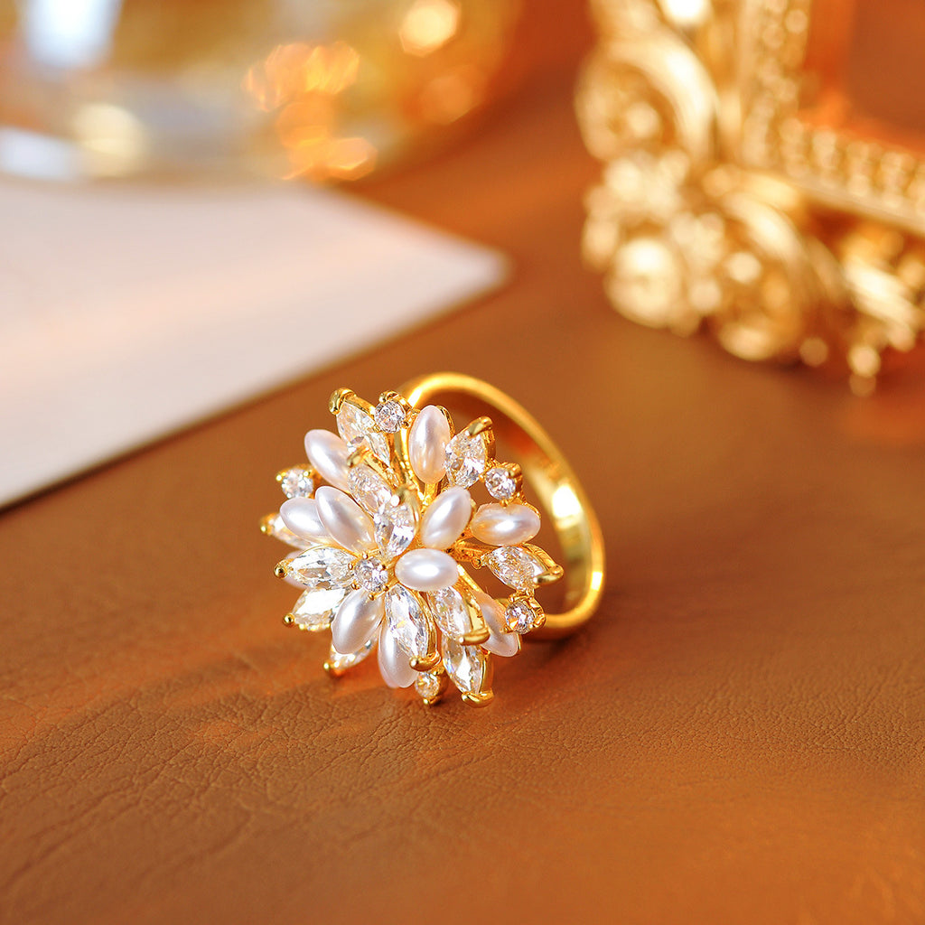 Super flash zircon pearl flower rotating ring opening niche design sense fashion hand jewelry women's tide