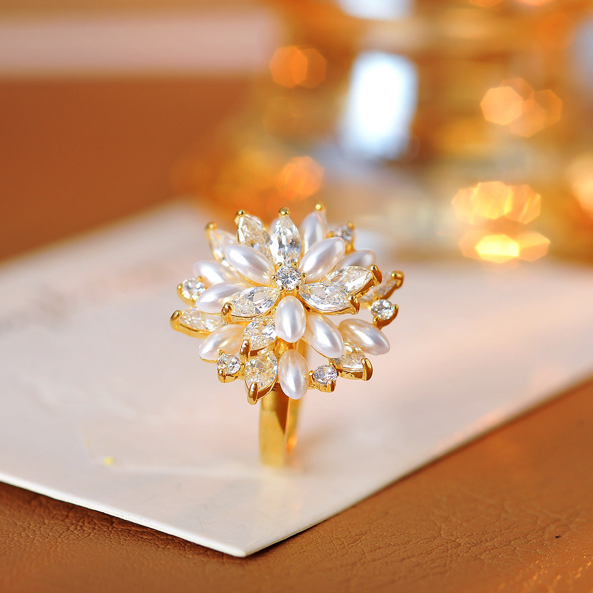 Super flash zircon pearl flower rotating ring opening niche design sense fashion hand jewelry women's tide