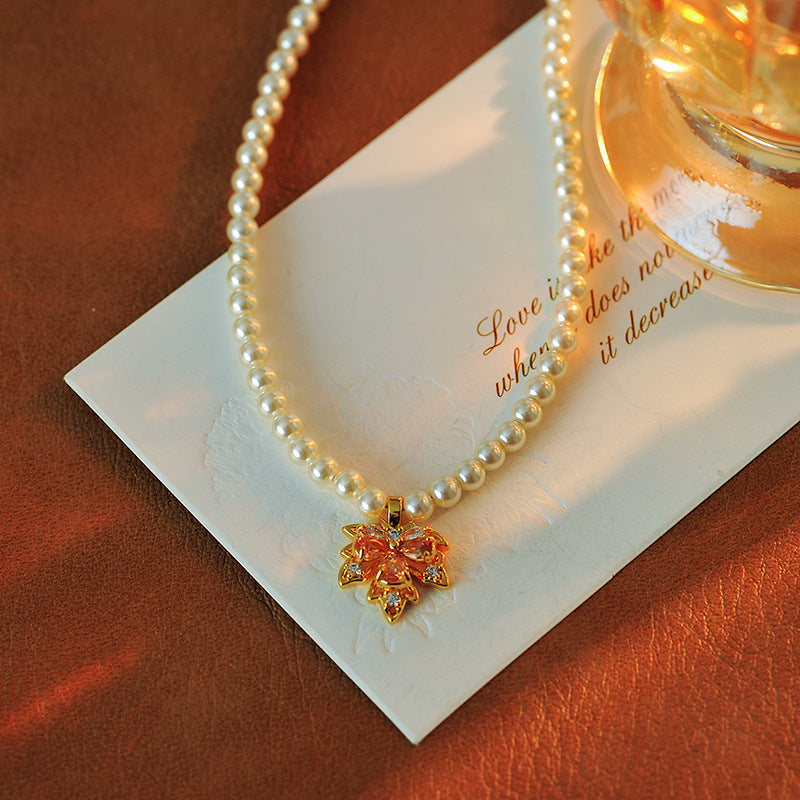 2025 New Maple Leaf Pearl Necklace Autumn Winter Light Luxury Niche Fashion Collarbone Chain Sweater Chain Versatile High-end Feel