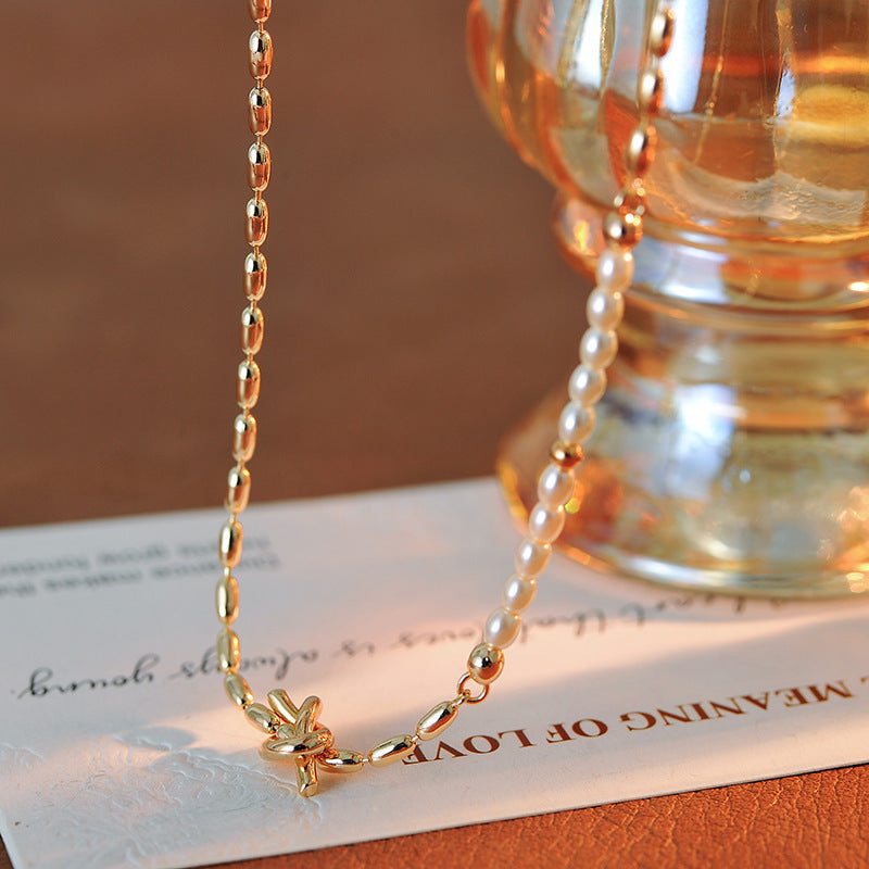 European and American Fashionable Elegant Pearl Knot Design Necklace Ins Trend Blogger Collarbone Chain One Piece