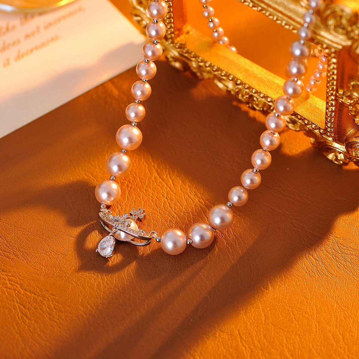 High-end Saturn Pearl Earrings for Women New Hot-selling Light Luxury Elegant Earrings Unique Niche Necklace