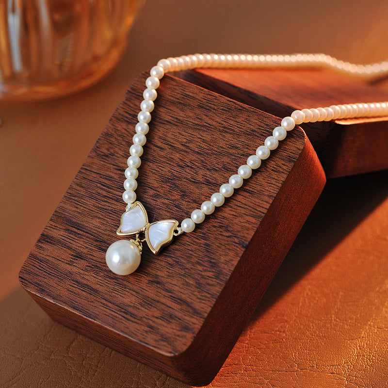 Freshwater Pearl Simple Fashion High-end Clavicle Chain Bow Pendant Korean Version Personality Necklace A10258