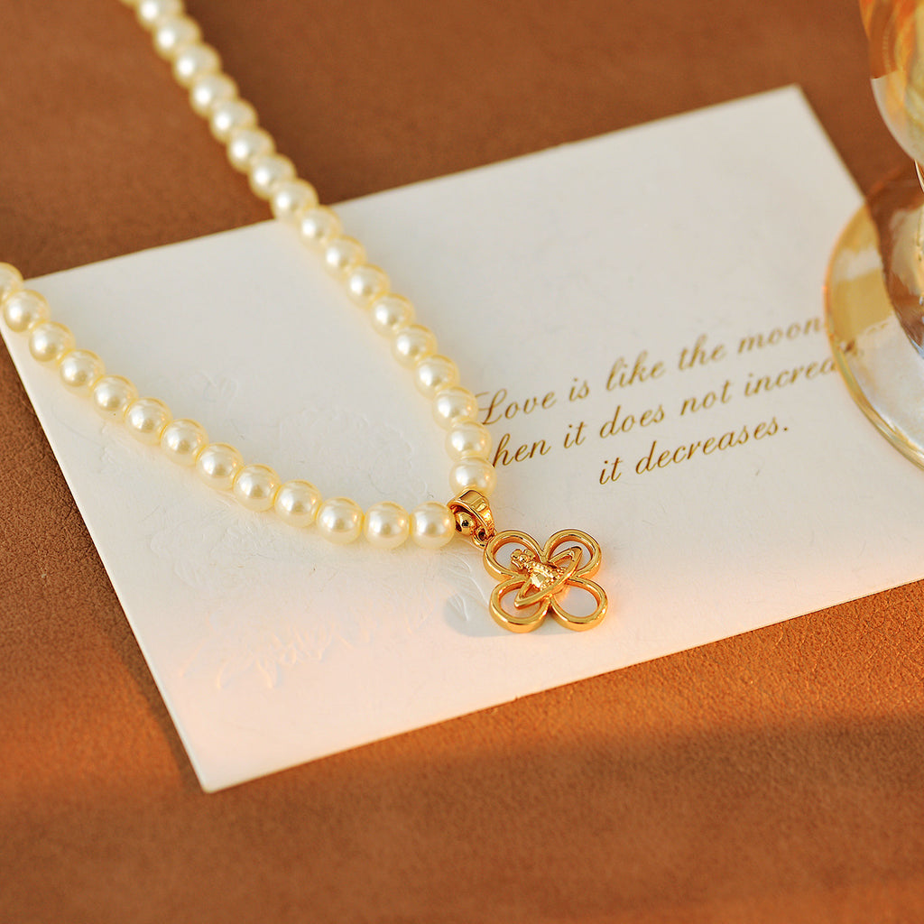 Saturn Flower Four-Leaf Clover Pearl Necklace Light Luxury Style High-End Design Collarbone Chain Elegant Necklace