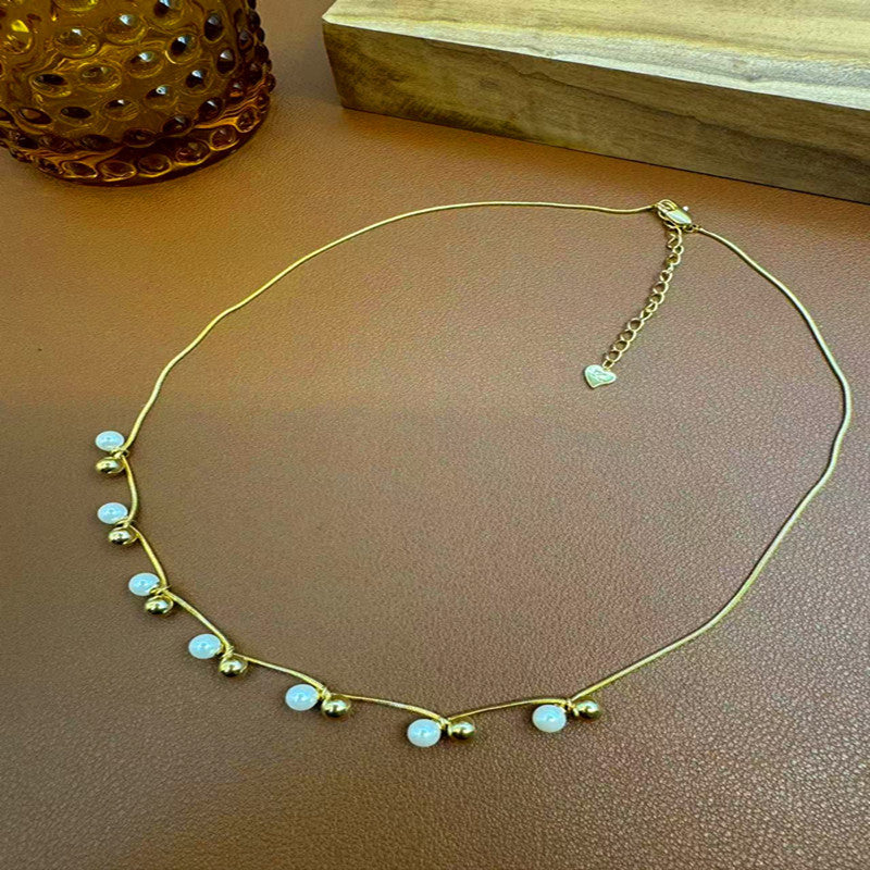 Hot-Selling Gold-Plated Small Pearl Necklace for Women, Light Luxury, Niche, High-End French Style, Elegant and Simple Collarbone Chain