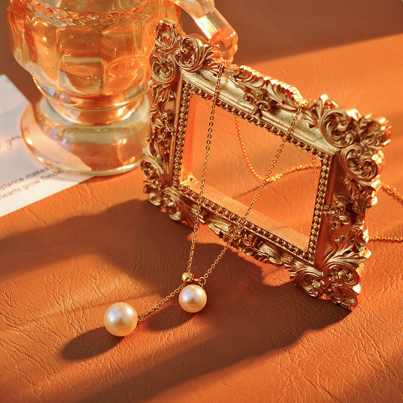 Light Luxury Fashion Design Natural Pearl Collarbone Necklace Strong Light Small Bulb Y-shaped Choker Simple Elegant Women's Ins Trend