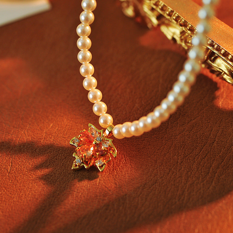 2025 New Maple Leaf Pearl Necklace Autumn Winter Light Luxury Niche Fashion Collarbone Chain Sweater Chain Versatile High-end Feel