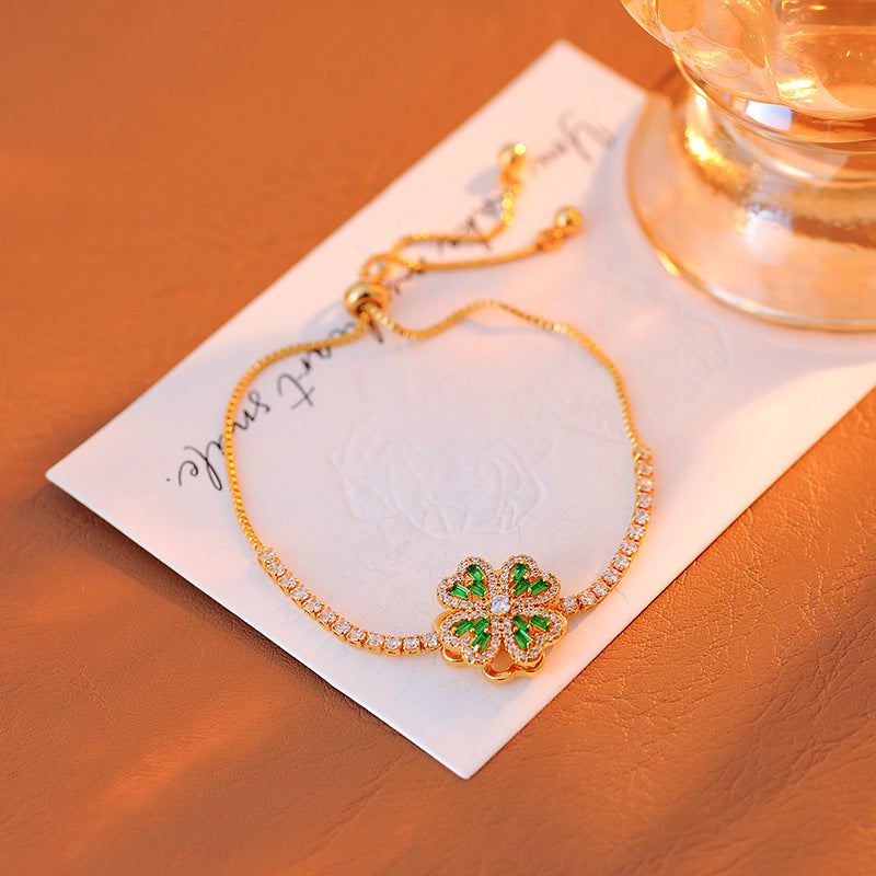 Japanese and Korean Exquisite Small Rotating Four-Leaf Clover Fashion High-End Micro-Inlaid Zircon Pendant Versatile High-End Necklace Collarbone Chain