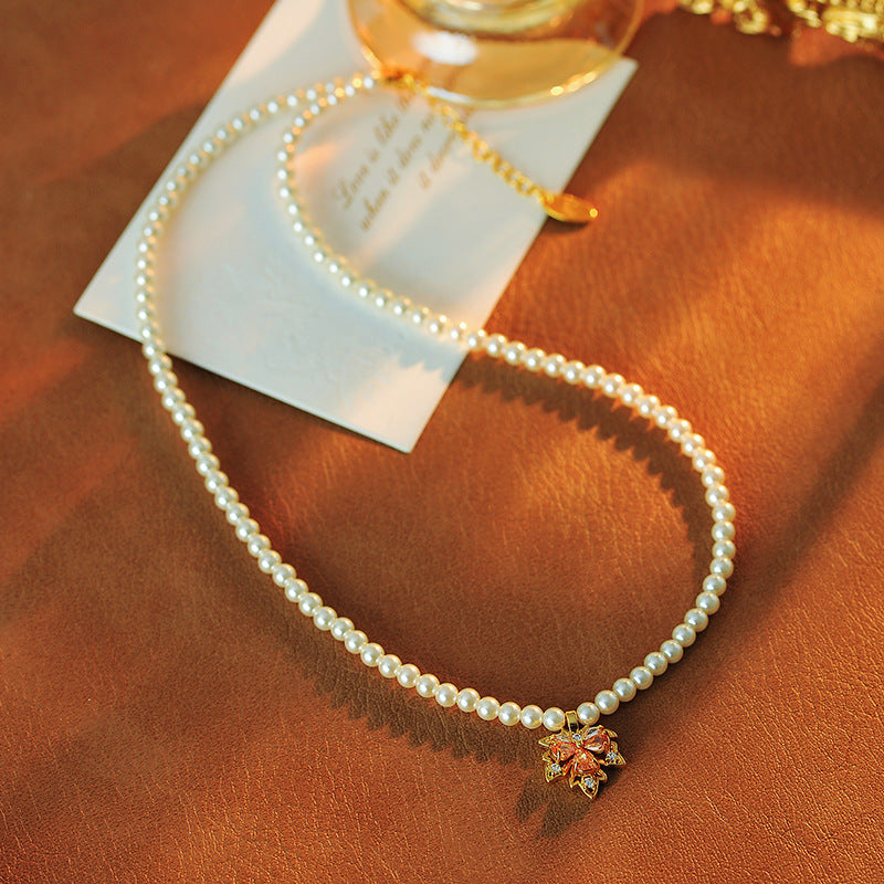 2025 New Maple Leaf Pearl Necklace Autumn Winter Light Luxury Niche Fashion Collarbone Chain Sweater Chain Versatile High-end Feel