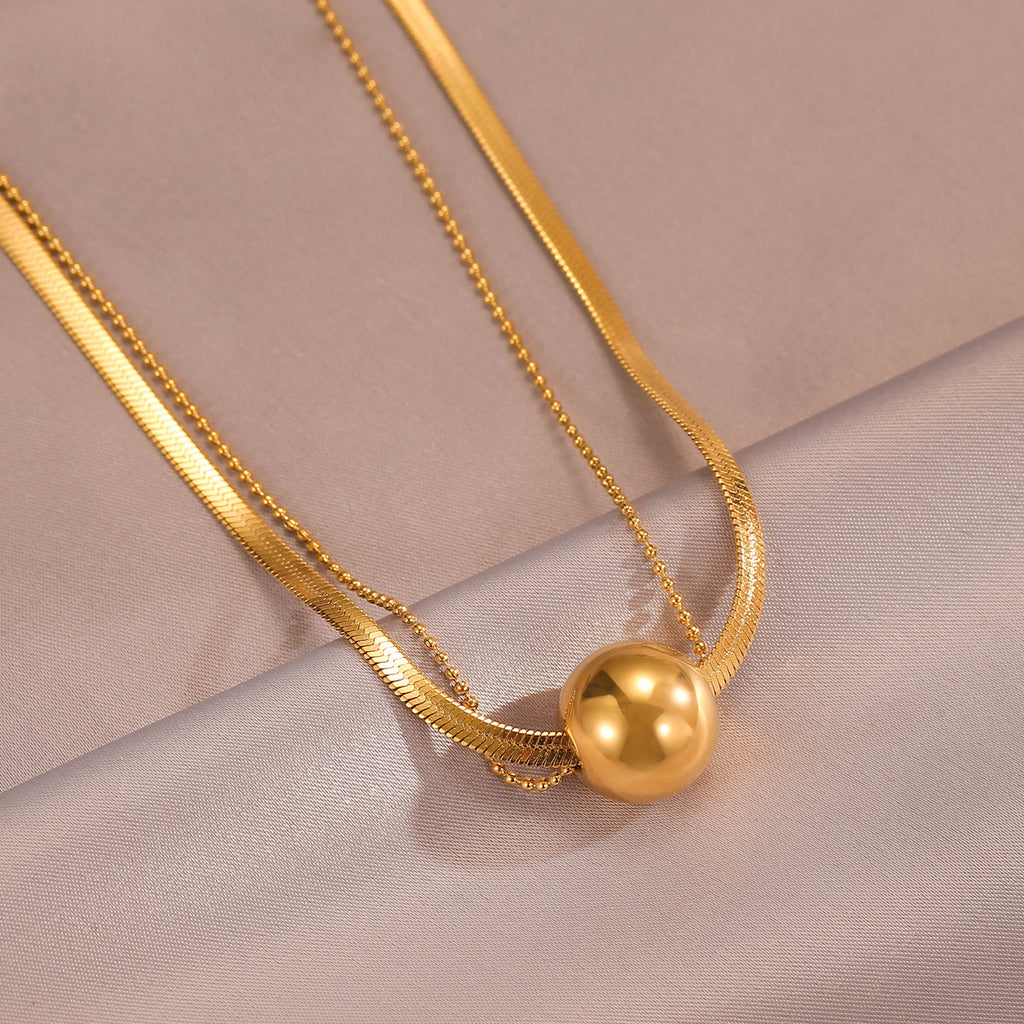 Titanium Steel Gold Round Ball Pendant Snake Bone Necklace for Women Minimalist Style Simple Niche Design Fashion Collarbone Sweater Chain