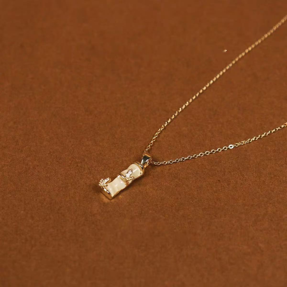 New Chinese Style National Trend Necklace High-end Elegant Inlaid Diamond Cat's Eye Stone Bamboo Knot Necklace Light Luxury Niche Design