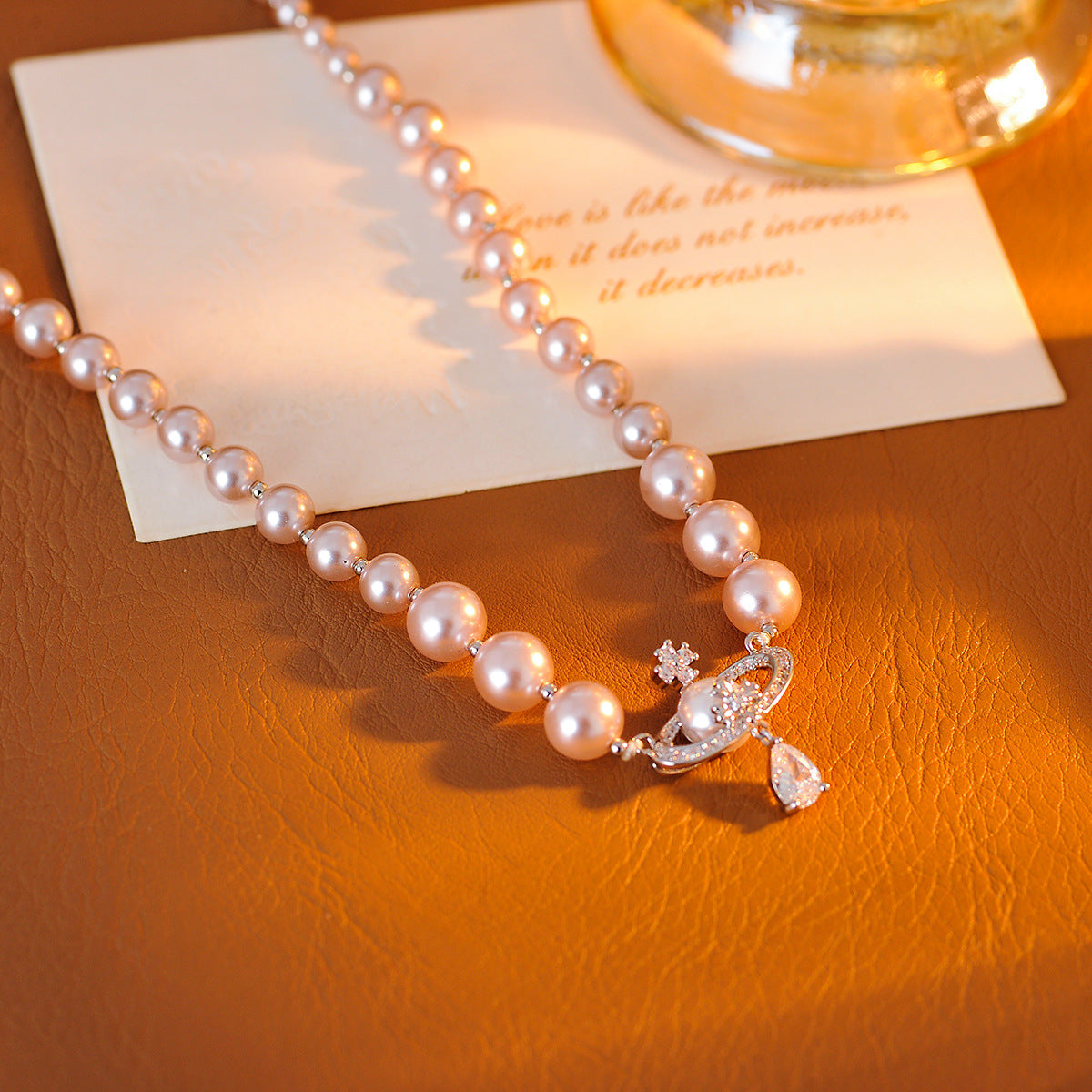 High-end Saturn Pearl Earrings for Women New Hot-selling Light Luxury Elegant Earrings Unique Niche Necklace