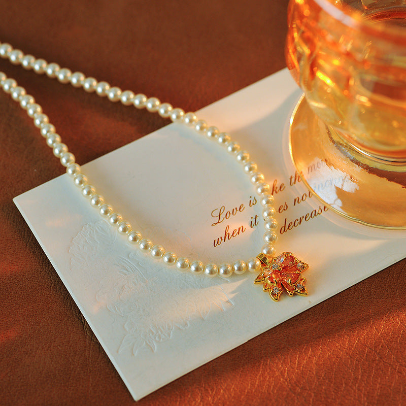 2025 New Maple Leaf Pearl Necklace Autumn Winter Light Luxury Niche Fashion Collarbone Chain Sweater Chain Versatile High-end Feel