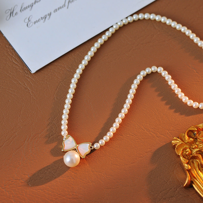 Freshwater Pearl Simple Fashion High-end Clavicle Chain Bow Pendant Korean Version Personality Necklace A10258