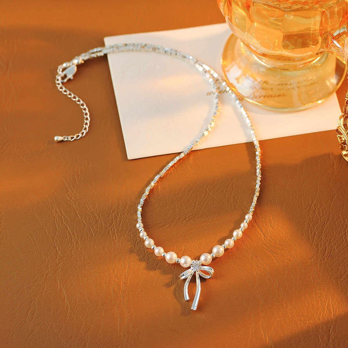 2025 New Hot Style Exquisite High-end Broken Silver Pearl Bowknot Light Luxury Niche Collarbone Necklace