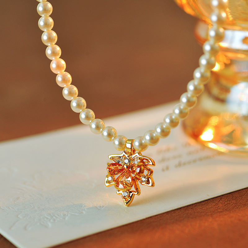 2025 New Maple Leaf Pearl Necklace Autumn Winter Light Luxury Niche Fashion Collarbone Chain Sweater Chain Versatile High-end Feel